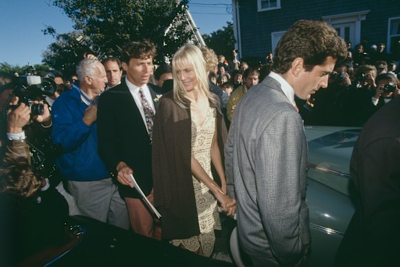 John F. Kennedy, Jr. and Daryl Hannah at a wedding in 1993. The pair split the following year.