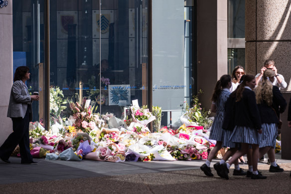 Flower tributes outside St Andrew’s Cathedral School on Monday.