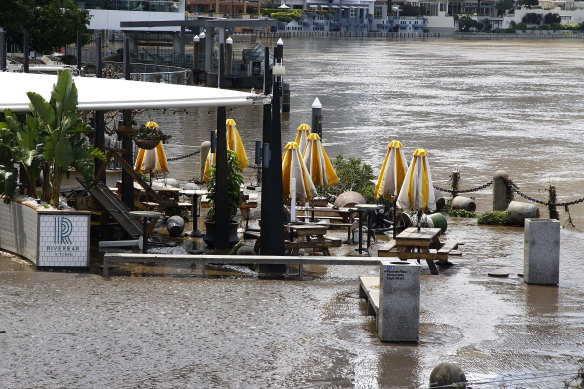Brisbane’s Riverbar at Eagle Street was inundated.