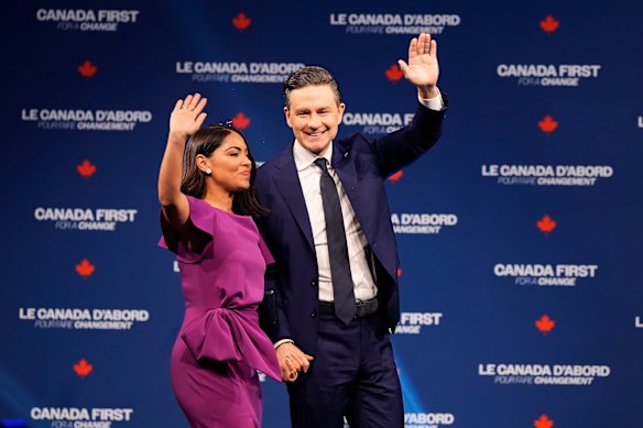 Conservative leader Pierre Poilievre and his wife Anaida Poilievre arrive on stage at his campaign headquarters on election night.