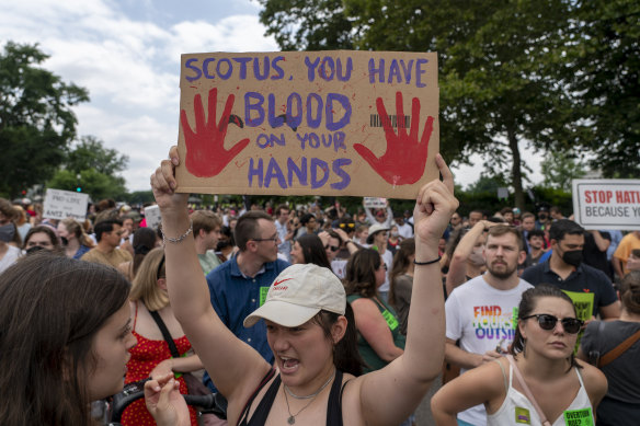 Crowds outside the US Supreme Court in Washington on Friday.