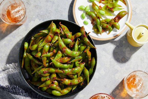 Edamame with spicy garlic sauce.