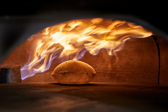 Blistered, wood-fired bread at Iftar.