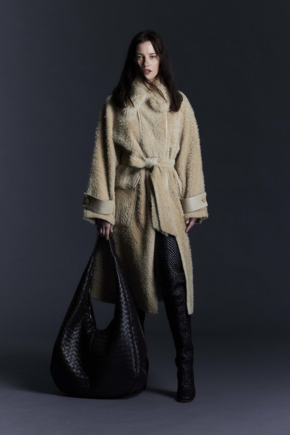 Joseph shearling coat, Bottega Veneta boots and bag.