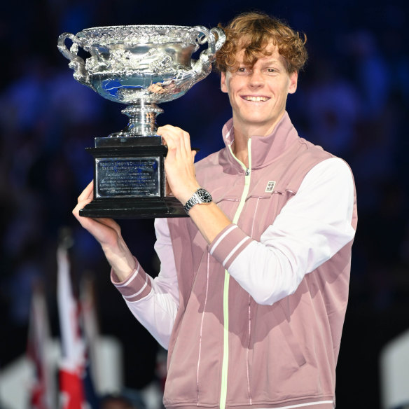 Jannik Sinner with his maiden grand slam trophy for winning the 2024 Australian Open men’s singles title.