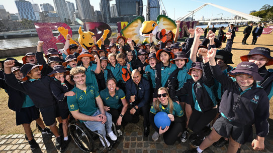 Wynnum State School pupils with Olympians and Paralympians Eithen Leard (wheelchair basketball), Emily Seebohm (swimming), Patrick Johnson (athletics) and Raissa Martin (goalball) celebrate eight years to go until Brisbane 2032 at South Bank.
