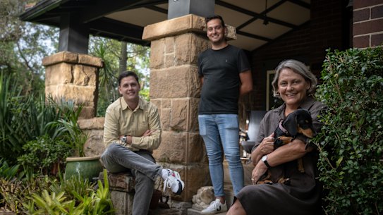 Kate Roberts and her sons Alastair (right) and Hugo Fisher at their Croydon family home, which will go to auction next month.