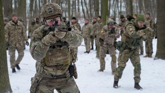 Volunteers in Ukraine’s Territorial Defence Forces train in a city park in Kiev.