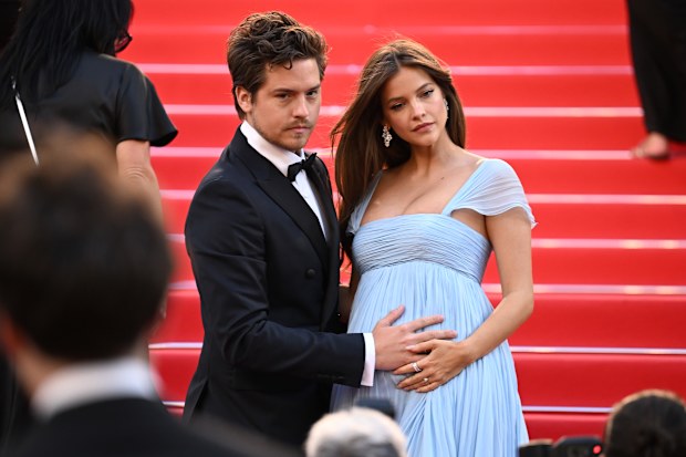 Dylan Sprouse and Barbara Palvin attend the "Histoires Parallèles (Parallel Tales)" screening during the 79th annual Cannes Film Festival at Palais des Festivals on May 14, 2026 in Cannes, France.