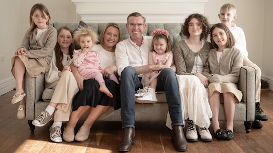Former premier Dominic Perrottet at home with wife Helen and the couple’s seven children.