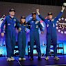 From left, Jeremy Hansen, Christina Koch, Victor Glover and Reid Wiseman, the Artemis II crew, are welcomed on stage during a news conference following their mission orbiting the moon, in Houston, on Saturday, April 11, 2026. (Raquel Natalicchio/Houston Chronicle via AP)