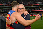 Lions coach Chris Fagan celebrates.