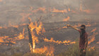 Residents stand ready to fight wildfires in Apollana, Rhodes in Greece. 