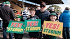 Stadium fans Hudson, Noah and Jack with Jack’s dad Aaron Hilder at the start of a march on Saturday in support of Hobart’s proposed AFL stadium.