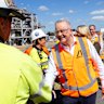 Prime Minister Anthony Albanese greeting a Queensland oil refinery worker on Thursday morning.