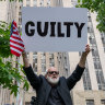 People celebrate after former president Donald Trump was found guilty on all counts at Manhattan Criminal Court on Thursday.