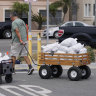 Bustling Los Angeles goes quiet, shelves empty as once-in-a-century storm approaches