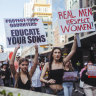 Women rally in Sydney’s CBD on Saturday.