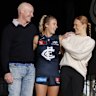 Carlton premiership player Andrew McKay with daughters Abbie, centre, and Sophie.