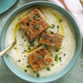 Cauliflower, thyme and potato soup topped with mini cheese toastie bites.