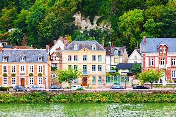 The historic village of La Bouille, nestled along a bend of the Seine River just southwest of Rouen.