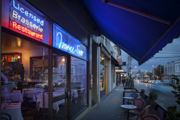 France-Soir’s tri-colour neon sign aglow on Toorak Road.