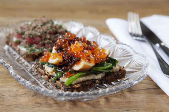 One of Molli’s open-faced sandwiches, topped with egg, greens and skordalia.