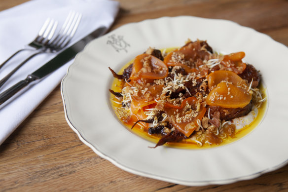 Carrots with pickled persimmons reflect new chef Caitlin Koether’s wholesome style.