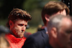 Dane Rampe looks on as Dean Cox and Callum Mills address the media.