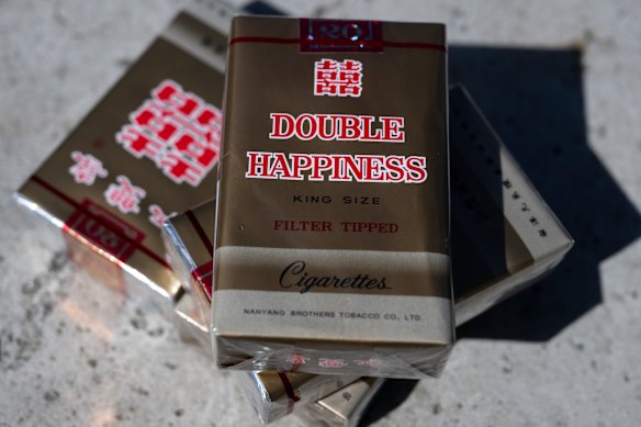 Illicit Double Happiness cigarettes, which are sold for as low as $13 in stores.