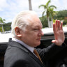 Julian Assange leaving the court in Saipan.