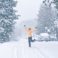 June 4: Falls Creek local Sarah Gamon celebrates 15cm of fresh snow.