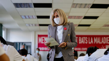 French President Emmanuel Macron's wife Brigitte Macron is a champion of bookstores and a former teacher. 