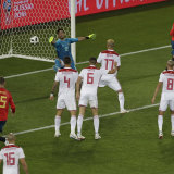 Morocco goalkeeper Munir El Kajoui fails to keep out Iago Aspas' flick.