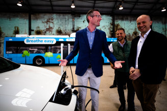 Treasurer Dominic Perrottet, Minister for Transport and Roads Andrew Constance, and Minister for Energy and Environment Matt Kean at the EV policy launch in June.