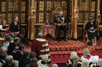 Prince Charles reads the Queen's speech: Prince Williams to his left, and Camilla, Royal Consort to his right.