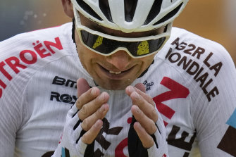 Australia’s Ben O’Connor celebrates as he crosses the finish line to win the ninth stage of the Tour de France cycling race over 144.9 kilometers on Sunday.