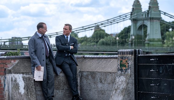 “I don’t want to just turn up, do the job, go home. That’s not the way I do things.” Daniel Craig with Ralph Fiennes as M in No Time To Die. 