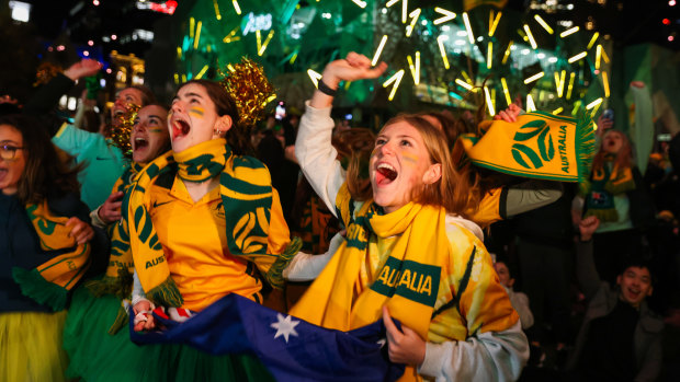 Fans at Melbourne’s Federation Square cheer on the Matildas during the FIFA World Cup.
