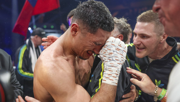 Jai Opetaia breaks down in tears after winning the world title.