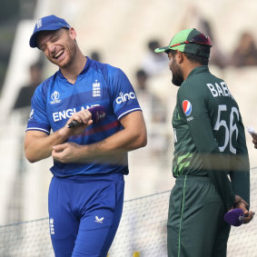 England captain Jos Butler with then Pakistan counterpart Azam during the 50-over World Cup in India.