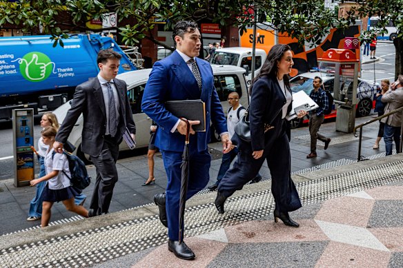 Alan Jones’ legal team, headed by Bryan Wrench, arrives at the Downing Centre Local Court on Thursday.