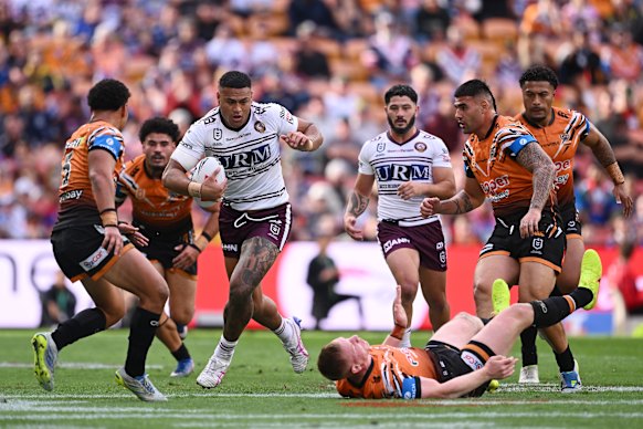 Haumole Olakau’atu charges through the Tigers line. 