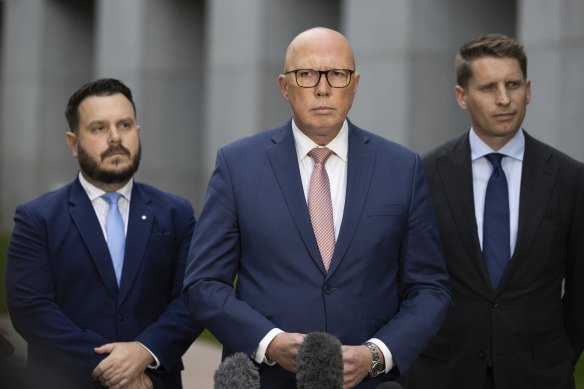 Dutton, Hastie (right) and assistant defence spokesman Phillip Thompson (left) during the press conference.