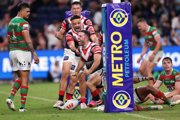 James Tedesco celebrates his second try.