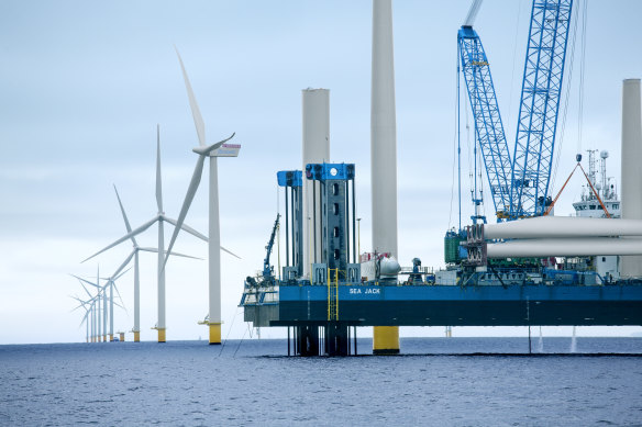 Offshore turbines, seen here in a file photo, can capture strong sea winds to generate more reliable power.