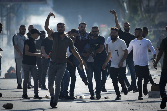 Palestinian protesters in the West Bank city of Nablus last week.