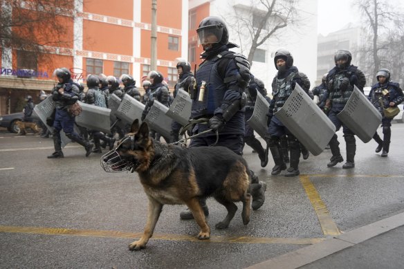 Troops from an alliance of countries led by Russia will now be sent to Kazakhstan to reinforce the country’s riot police, seen here in Almaty on Wednesday.