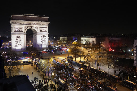 A heavy police presence on the Champs-Elysees witnessed mostly joy from fans of both the victor (France) and the losing team (Morocco) after their FIFA semifinal clash. 