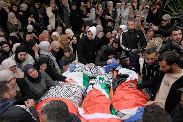 Palestinians mourn at the funeral of four members of the Odeh family, who were killed in their car by Israeli security forces in Tammun, West Bank, on Sunday.